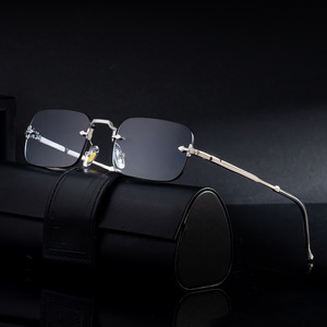 Lunettes de soleil unisexe sans monture à branches métalliques, verres PC UV400, monture noire fine, nouveau style 2025, tendance européenne et américaine, protection solaire - Product Image 1