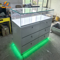 Table de présentation avec plateau en verre pour magasin de téléphonie mobile, comptoir de présentation blanc brillant avec plateau en verre verrouillable