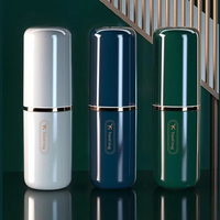 En gros, Ensemble de voyage portable en plastique pour la salle de bain, avec gobelet de brossage plaqué or, design simple et élégant, et boîte de rangement pour brosse à dents