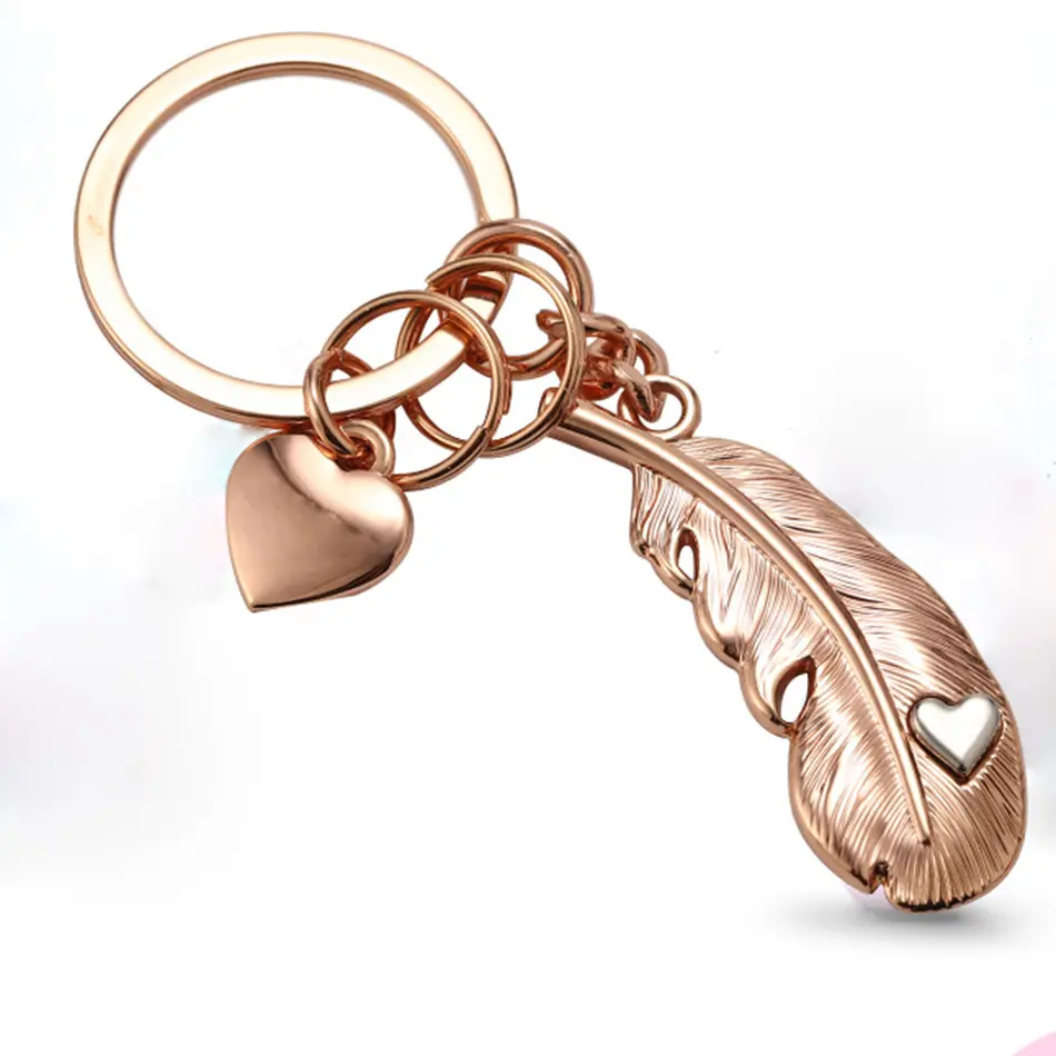 Factory wholesale custom Tik Tok Netflix car keychain men and women cute creative feather couple key chain ring bag charm
