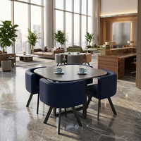 Ensemble de table et chaises de salle à manger d'hôtel moderne avec plateau en MDF, pieds en métal, revêtement en cuir PU/tissu lin, design rond, 4 places, durable