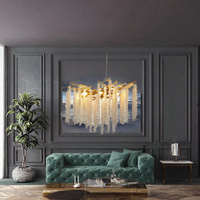 Lustre moderne de luxe en aluminium et cristal avec finition dorée, luminaire suspendu LED pour décoration intérieure haut de gamme