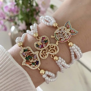 Pulsera Ajustable TK-B586 con Cuentas de Perlas Maravillosas, Dijes de Circonita Arcoíris, Mano de Hamsa Dorada, Búho y Mariposa, Estilo Vintage - Product Image 1