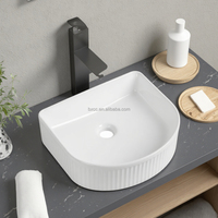 Vente en gros de lavabo moderne en céramique blanche rectangle sanitaire pour salles de bain d'hôtel largement utilisé dans les hôtels