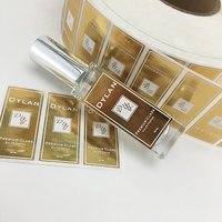 Étiquette d'autocollant de bouteille de parfum PET adhésive forte de logo doré étanche personnalisée de haute qualité