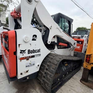 Chargeuse sur pneus d'occasion d'origine américaine Bobcat T770 avec chenilles en caoutchouc, fourche et tarière, à vendre - Product Image 1