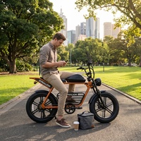 Vélo électrique rétro élégant à gros pneus avec panier de rangement inférieur, vélo électrique de banlieue orange pour les trajets quotidiens en ville