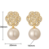 Boucles d'oreilles pendantes hypoallergéniques et étanches en forme de fleur avec zircon baguette plaqué or 18 carats et perle champagne, idéales pour mariages et occasions spéciales 2026