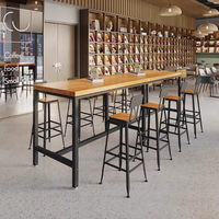 Tables et chaises de bar de restaurant à cadre en bois personnalisable Nouveau style pour les repas Fast Food Hot Pot-pour la cantine