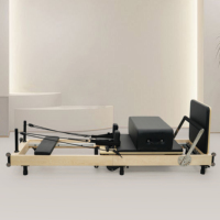 Lit de Pilates pliable en érable pour entraînement professionnel en studio, cadre en bois, logo personnalisé