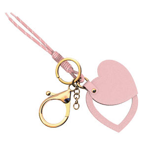Custom Logo Small Rotating Pu Leather Mirror Keychain Travel Heart <b>Makeup</b> Cosmetic Pocket Vanity Mini Hand Mirror Keychain - Product Image 2