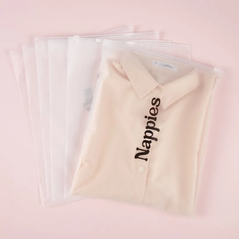 Özel Logo baskı fermuarlı çanta biyobozunur plastik ambalaj şeffaf EVA konfeksiyon giyim T-shirt için buzlu Zip kilit