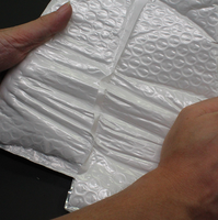 Vente en gros expédition sacs postaux d'emballage en plastique à bulles antichoc avec logo personnalisé courrier enveloppes auto-adhésives pour chiffons