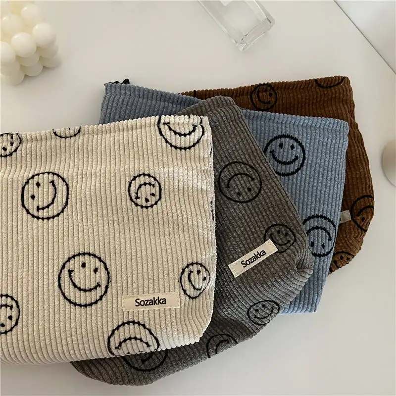 Wholesale price smiley face cosmetic bag corduroy care lash kit makeup organizer cosmetic bags pouch