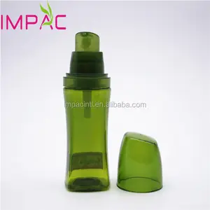キャップ付きのユニークな形の濃い緑色のプラスチック製の香りの香水瓶