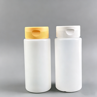 Bouteilles en PEHD de 300 ml en forme de cylindre vide, pour remplissage à chaud, avec bouchon à clapet souple pour sauce chocolatée, couleur personnalisée, 10 oz