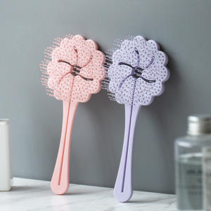 Brosse à cheveux démêlante et lisse de vente directe d'usine pour le massage du cuir chevelu brosse à lisser les cheveux à usage quotidien - Product Image 1