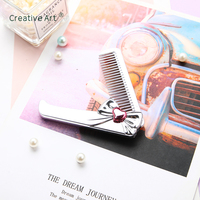 Nouveau modèle de mini peigne à cheveux Brosse à cheveux et peigne de voyage pliants de luxe avec marque privée Vente en gros