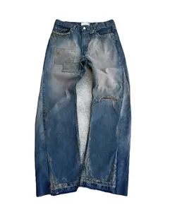 Zhuoyang Garment Customized Repaired Heavy Distressing Mud dye Patched Flared Stacked Designer Men studded Denim Jeans