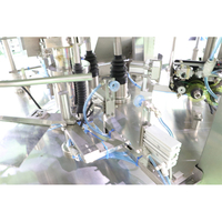 Machine d'emballage remplissante de peseuse multitêtes automatique d'oeufs de caille bouillis Machine à emballer sous vide d'oeufs pelés pour sac préfabriqué