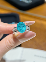 Bague de fiançailles en or 18 carats avec diamant de laboratoire bleu Paraiba taille ovale de luxe et bande pavée torsadée pour femme