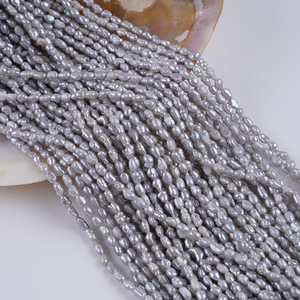 Vente en gros de perles d'eau douce naturelles 4-5 mm blanches, polies des deux côtés, grises, pour bracelet et collier DIY, trou droit, trou droit, trou droit - Product Image 1