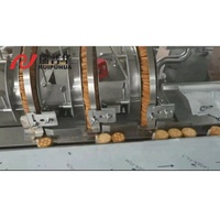 Machine d'emballage et de conditionnement automatique à flux continu pour biscuits, craquelins, gâteaux et autres produits alimentaires