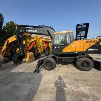 Promotion : Excavatrice sur pneus Hyundai d'occasion, modèle 210W-9T