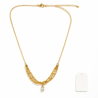 Collier en acier inoxydable plaqué or PVD 18 carats avec pendentif zirconium en forme de perles ovales souriantes, vente en gros