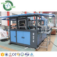 Machine de moulage par soufflage de bouteille de boisson gazeuse à quatre cavités 4000b/h eau gazeuse thé yaourt lait de soja 30ml 50ml 100ml 10cl