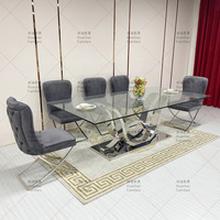 Table à manger rectangulaire moderne en verre pour 10 personnes avec structure en acier inoxydable pour la salle à manger d'hôtel