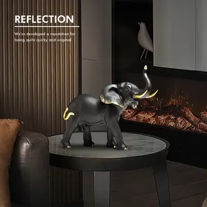Figurine créative d'éléphant noir et blanc de décor à la maison Accessoires de bibliothèque artistiques d'armoire de salon Statues d'animaux en résine