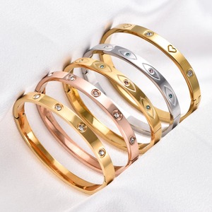 Bracelet manchette ouvert en acier inoxydable et zircone pour femme, motif œil et cœur, accessoire de bijouterie en métal poli, cadeau - Product Image 1