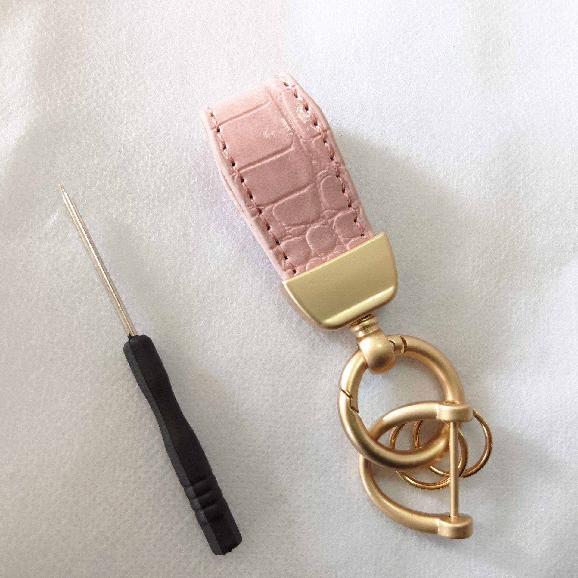 Cuero rosa/Metal (Oro perla)