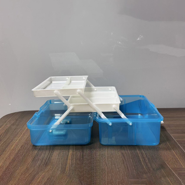 A Three-layer Plastic Toolbox That Can Hold Handmade Toys