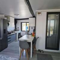 Maison miniature de luxe coupe-vent de 20/40 pieds, 4 chambres, préfabriquée, extensible, en conteneur, maison modulaire moderne, villa, séjour en station balnéaire