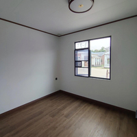 Module de maison conteneur extensible et détachable de 20 pieds, 2 chambres, design moderne, structure en acier, idéal pour appartements et hôtels - Vente chaude