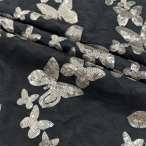 Fabricante de China, precio al por mayor, patrón de mariposa, encaje bordado, lentejuelas tejidas, tela de poliéster 100% para zapatos, textiles para el hogar - Product Image 2