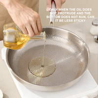 Poêle Wok antiadhésive en titane de grande capacité Design classique avec motif de feuille de Lotus Poêle à frire domestique profonde et durable