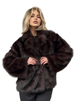 Manteau d'hiver élégant pour femme en fausse fourrure avec col à revers et manches longues