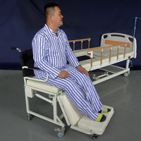 Fauteuil roulant manuel convertible multifonction pas cher pour personnes âgées, lit d'hôpital avec trou pour le toilette