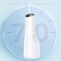 Impression personnalisée à faible quantité minimale de commande fil dentaire électrique micro USB à chargement sans fil fil irrigateur buccal étanche IPX7 fil dentaire