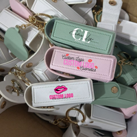 Mignon porte-clés en cuir coeur fleur forme Mini miroir avec étui brillant à lèvres en gros marque privée huile pour les lèvres outil de maquillage