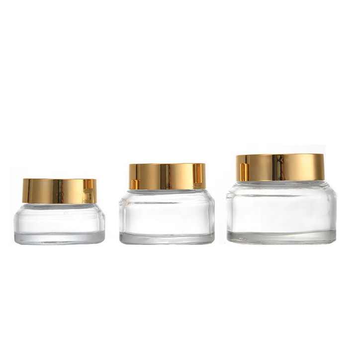 In Stock 15ml 30ml 50ml 100ml Slant Shoulder Clear Glass Face Cream Jars With Gold Cap (GJM07)
