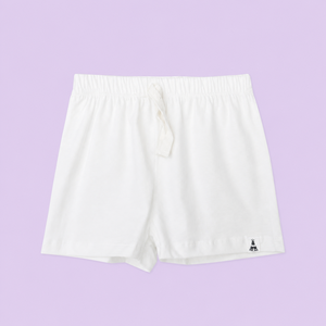 Pantalones casuales blancos que ofrecen una suavidad premium, costuras duraderas y un estilo clásico para el día a día para niños energéticos. - Product Image 1