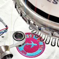 Machine à broder à 24 têtes et 10 aiguilles à tête ronde, haute précision avec dispositif de cordage pour badges et écussons