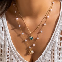 Ensemble de colliers multicouches tendance en alliage avec imitation perles, coquillages et étoiles de mer, style européen et américain, pour femmes