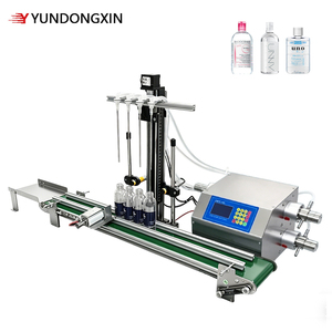 Machine de remplissage de liquides automatique à levage haute performance avec quatre postes de remplissage et pompe à entraînement magnétique pour <span class=keywords><strong>le</strong></span> remplissage d'eau pure - Product Image 2