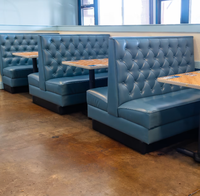 Meubles de restaurant de luxe haut de gamme, canapé en cuir uni avec table et chaises pour restaurant occidental