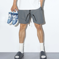 Ensemble short et coupe-vent décontracté taille mi-haute en nylon écologique pour homme, coupe oversize brillante avec cordon de serrage – Vente en gros